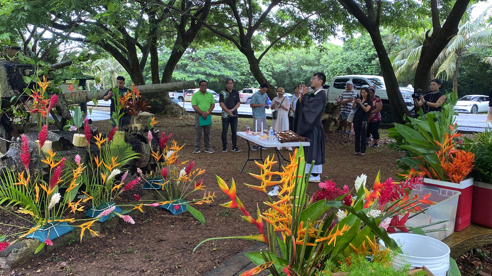 Visiting Mikkyo priest Koji Kanamori offers prayers in front of a World War II-era tank in Marpi.