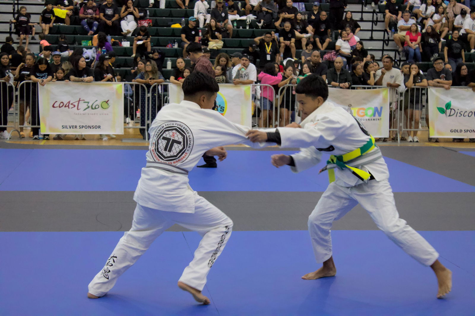 Trench Tech Purebred Saipan’s Trey “King Koa” Camacho Manglona battles for position during his silver-medal match in the No-Gi Teens 116 lbs division of the 2025 Påtgon Jiu Jitsu Tournament on Saturday at the UOG Field House in Mangilao, Guam.