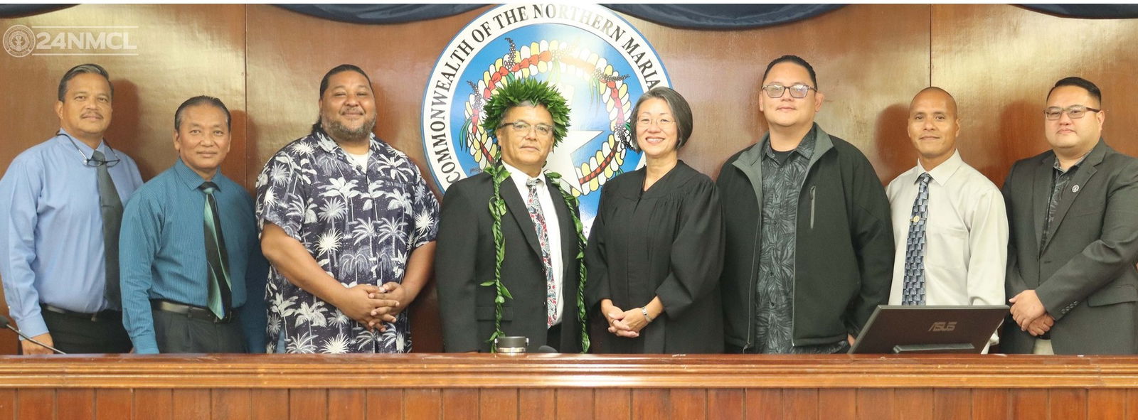 Sen. Paul A. Manglona, fourth left, and Associate Judge Teresa Kim-Tenorio, fourth right, with Senate President Karl King-Nabors, third left, and other members of the 24th Senate following Manglona’s swearing-in ceremony on Thursday in the Senate chamber.Legislative Bureau photo