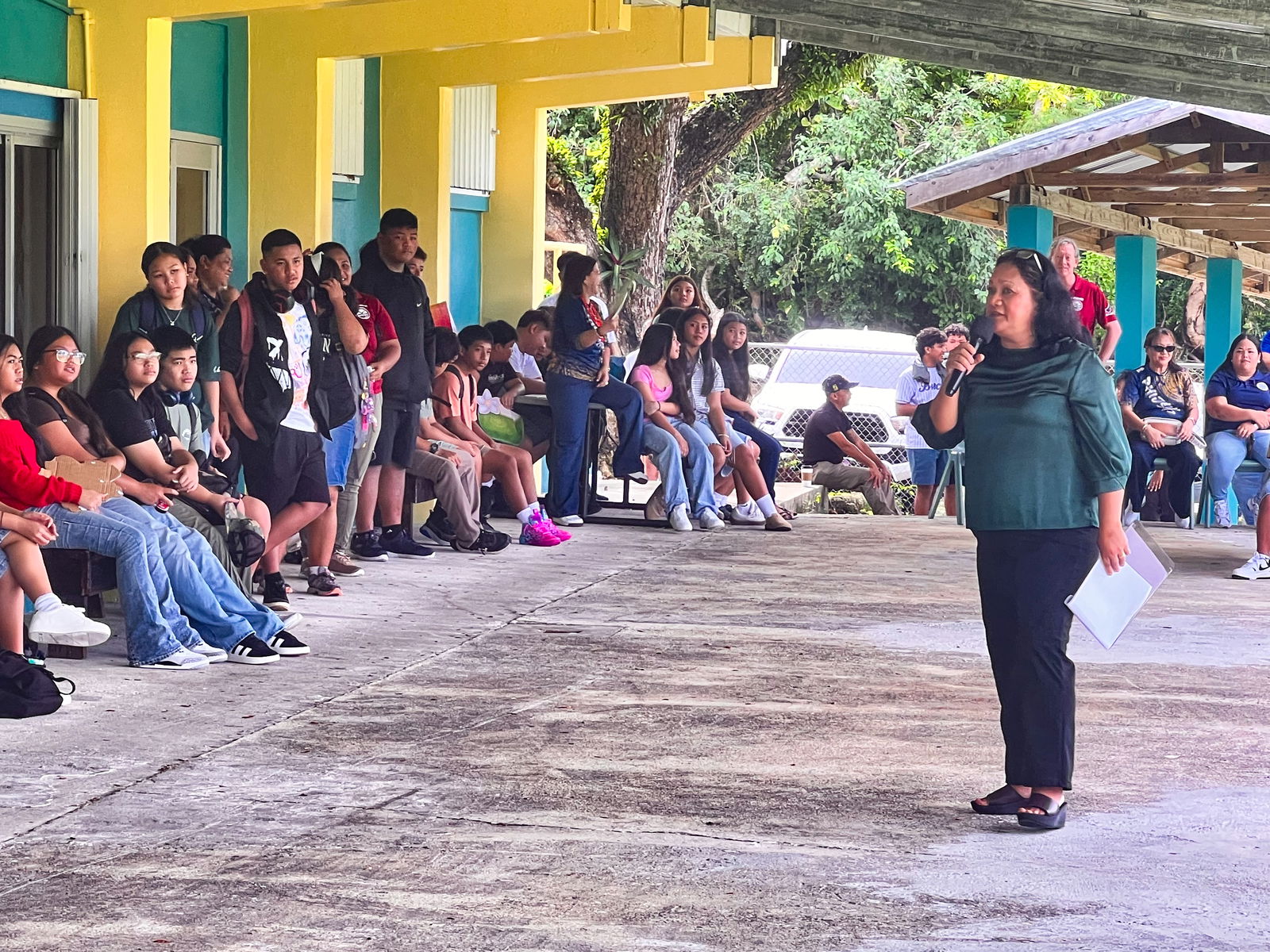 Principal Annette A. Calvo addresses her Dr. Rita Hocog Inos Junior and Senior High School students and staff on the first day of the new school year.