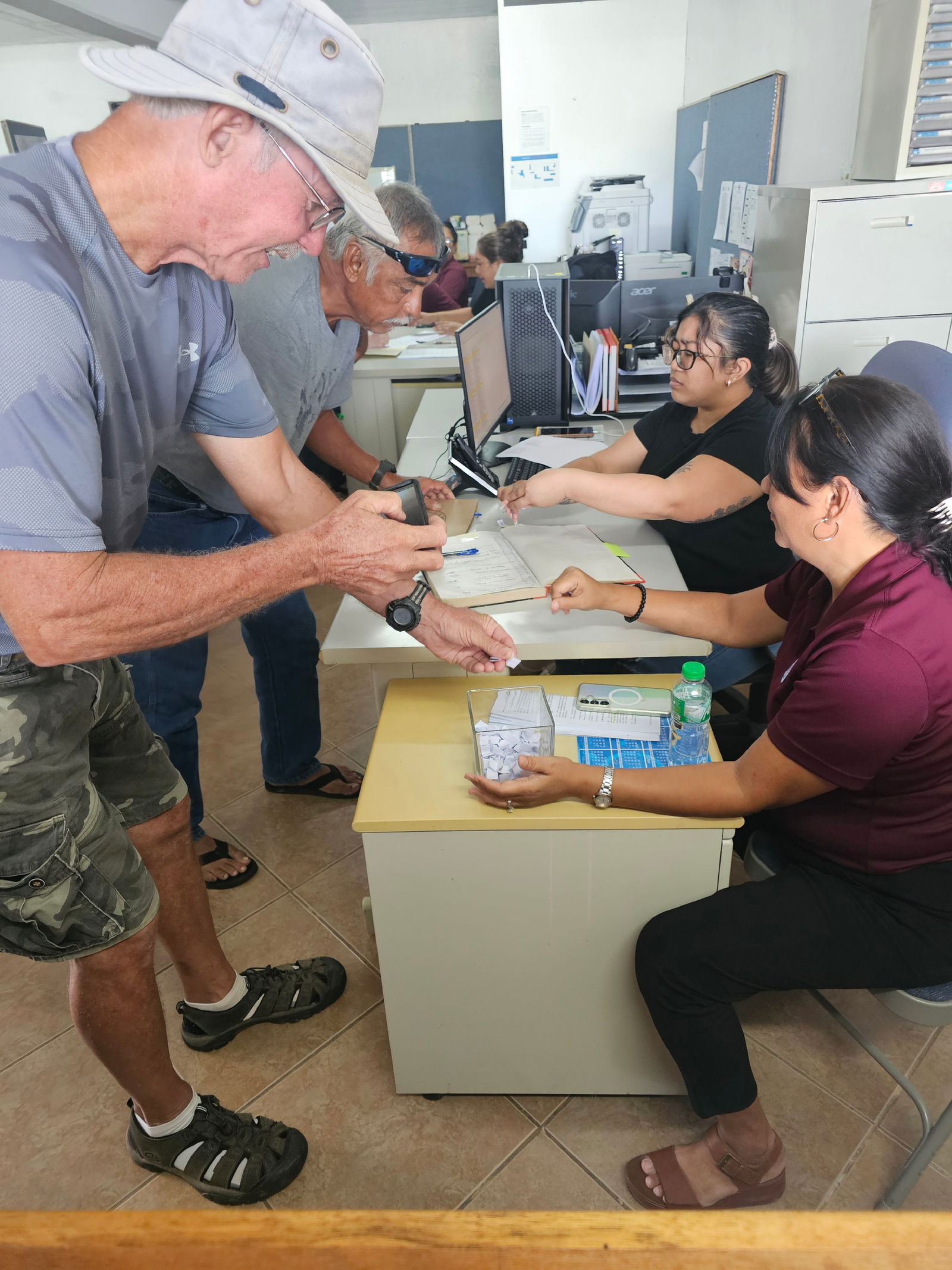 Tinian residents draw lots.