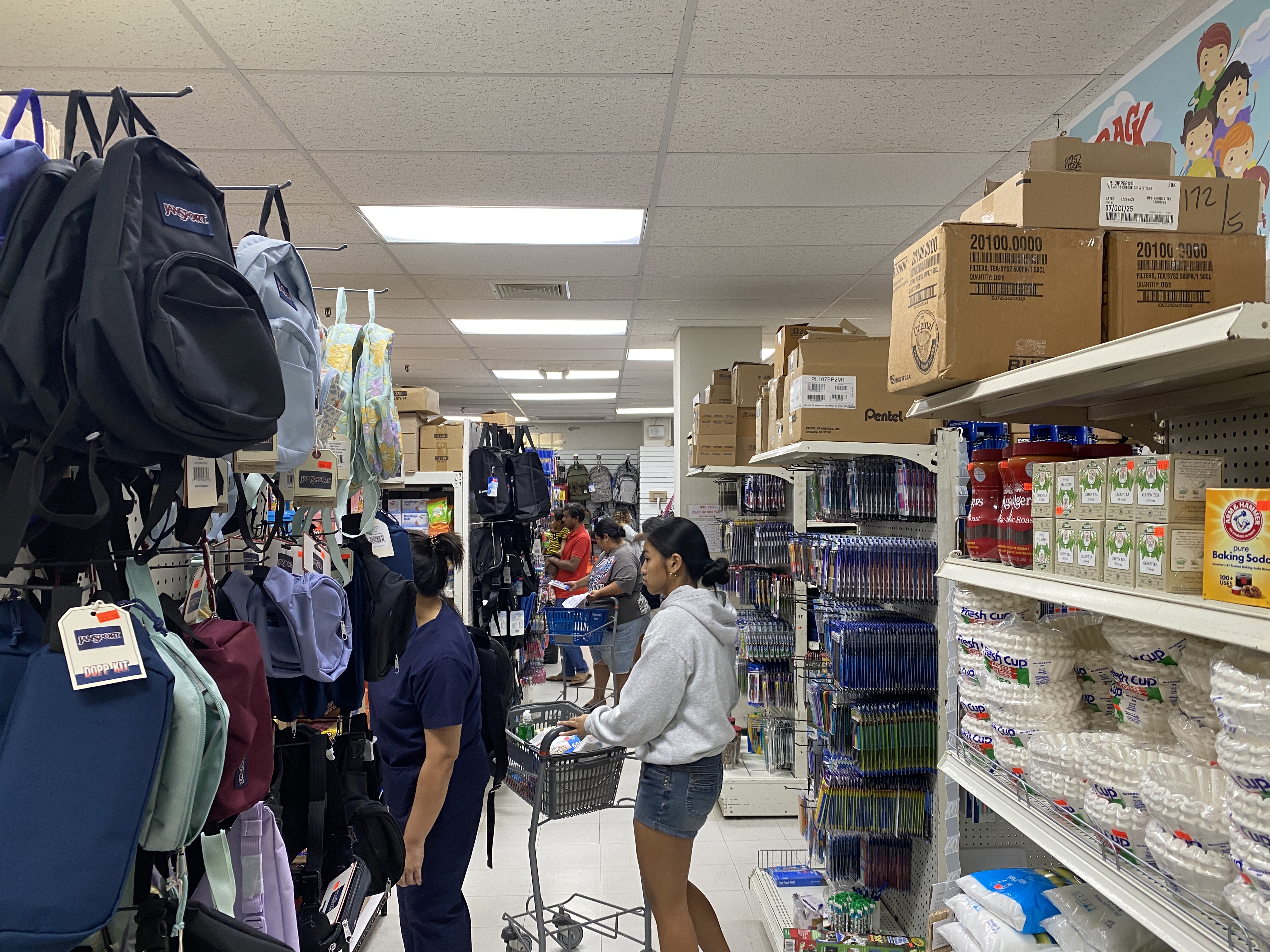 Shoppers inside National Office Supply on August 7.
