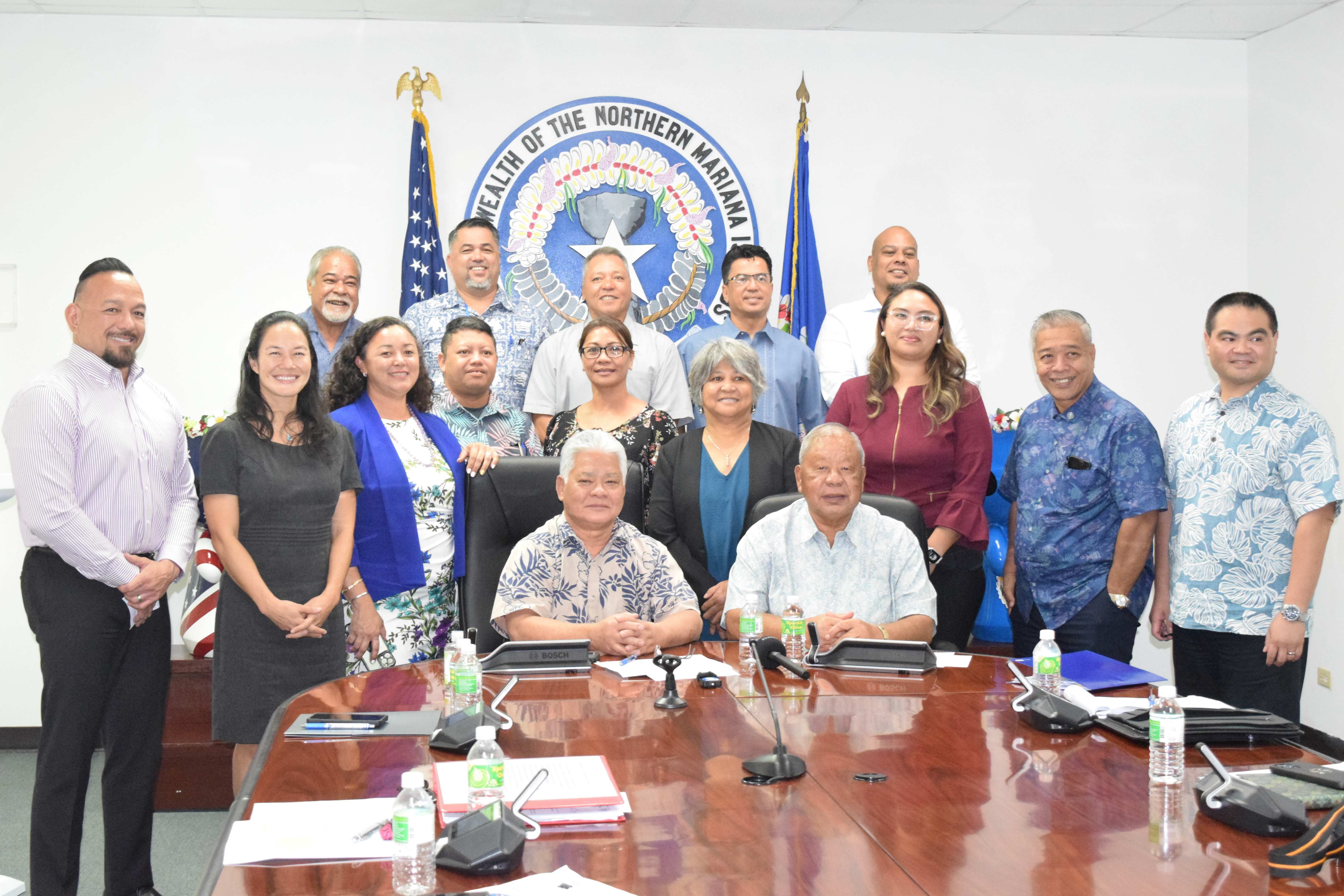 Gov. Arnold I. Palacios and Lt. Gov. David M. Apatang with cabinet members and other CNMI officials.