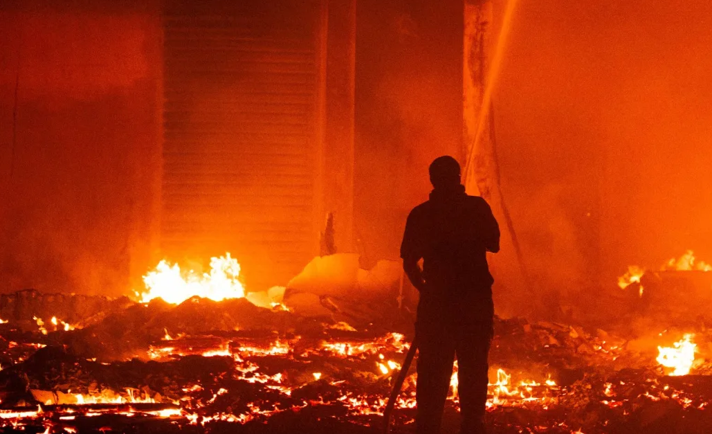 Marshall Islands firefighters try to contain the fire.Photo by Chewy Lin/RNZ Pacific