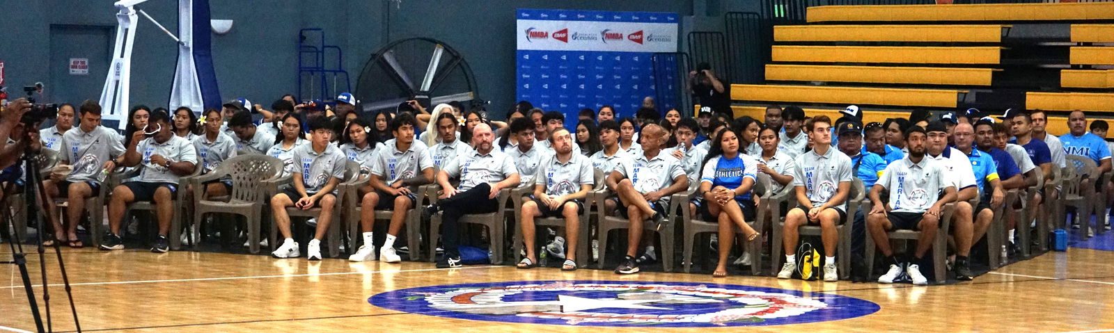 Team Marianas athletes look on as Chef de Mission Nick Gross (not in photo) shares his opening remarks during the appreciation ceremony hosted by the Northern Marianas Sports Association on Thursday at the Ada gym.Photo by James F. Sablan Jr.