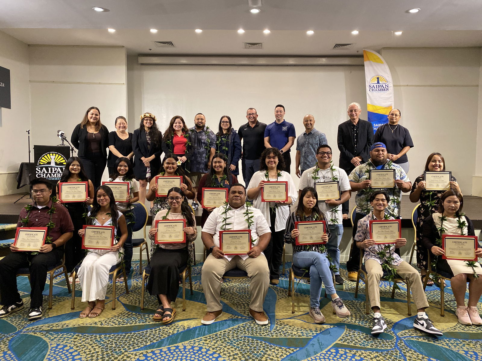 The recipients of the Saipan Chamber of Commerce scholarships pose for a group photo.