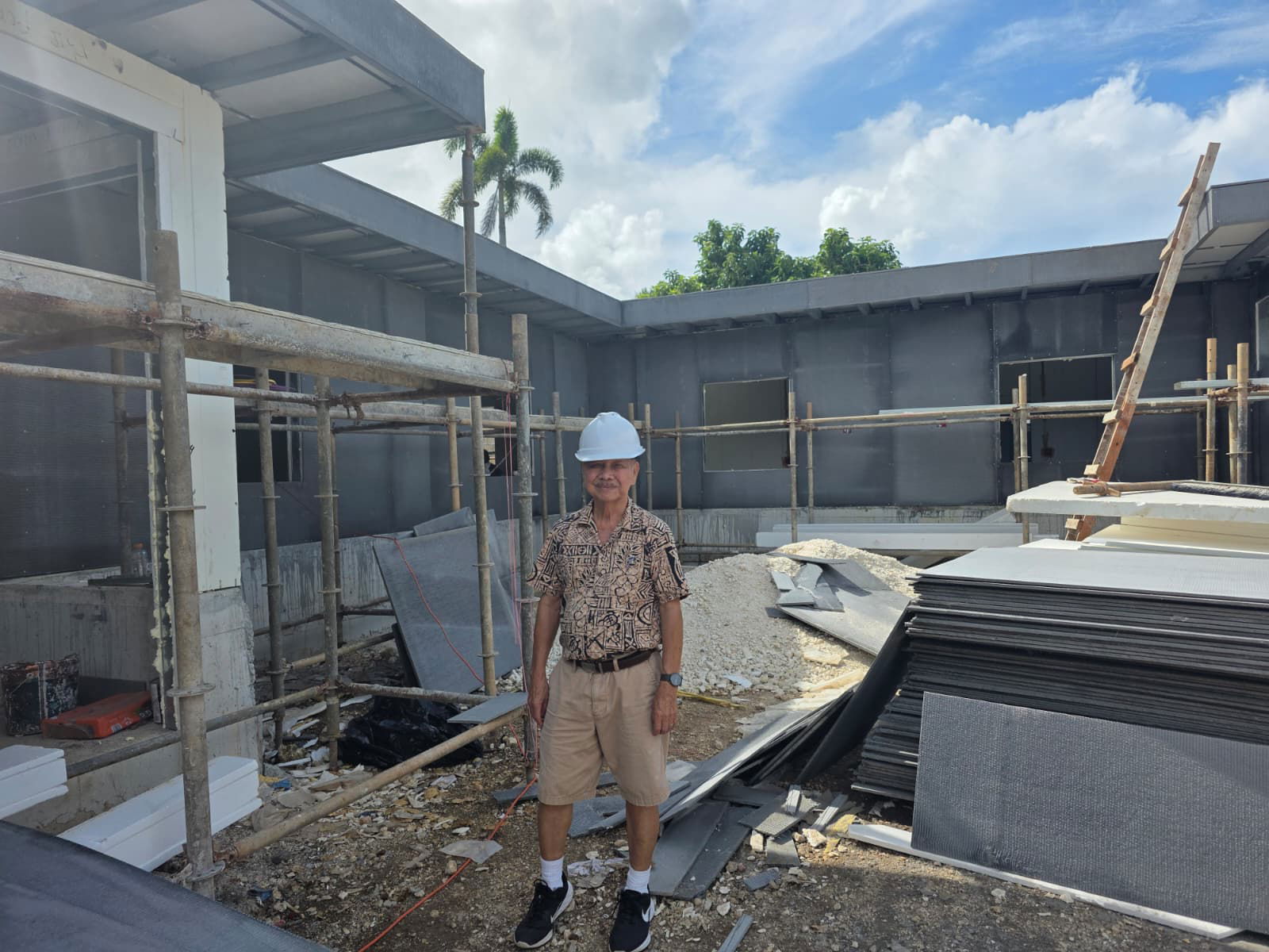 Local architect Herman Blas Cabrera stands at the construction site of one of his Capital Hill housing projects, which features advanced technology building materials. Photo by Emmanuel T. Erediano