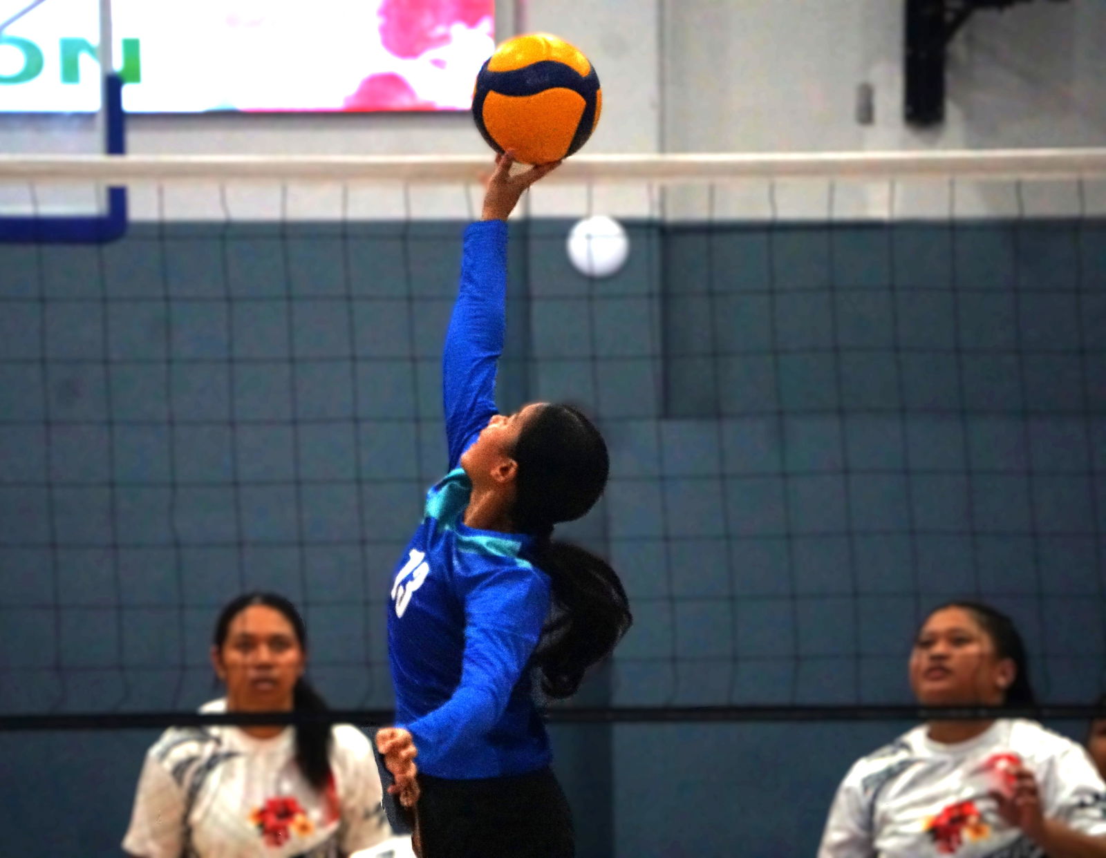 Geckos’ Keylie Claveria rises to tip the ball over the net during a women’s division game of the 4 Starz Marianas Club 2nd Annual Fall Fest Volleyball Tournament 2025 at the Ada gym.Photo by James F. Sablan Jr.