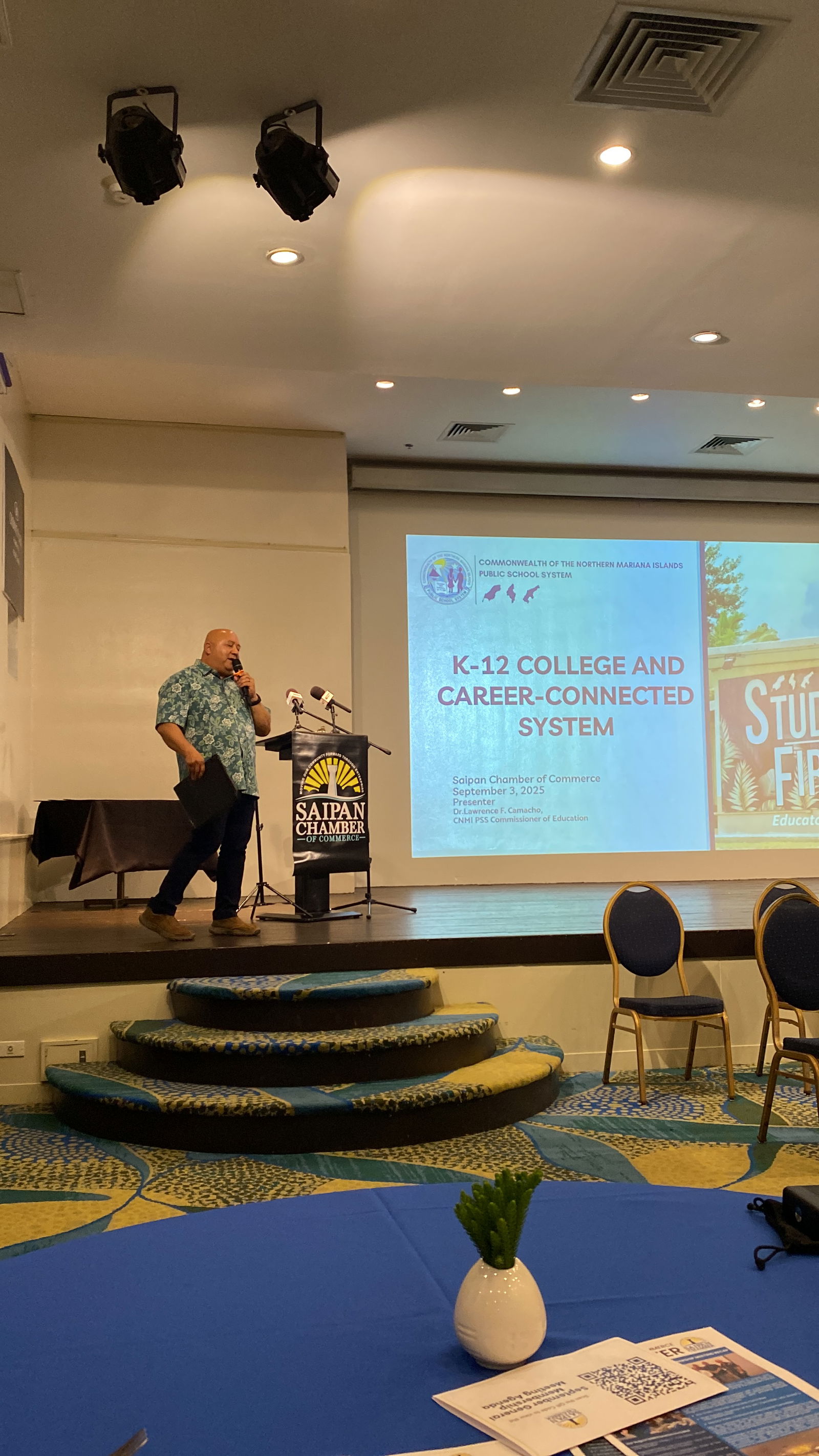 Commissioner of Education Lawrence Camacho paints the “portrait of a graduate” as part of a presentation at a recent Saipan Chamber of Commerce general membership meeting.