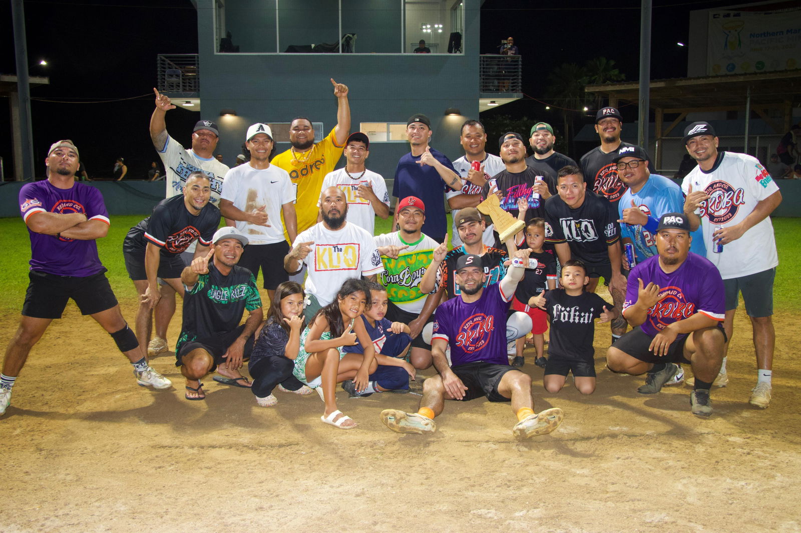 Skoba players poses for a group photo after winning the men's division championship of the 2nd Annual Labor Day Softball Tournament on Sunday at the Francisco "Tan Ko" Palacios Baseball Field.Stormy Salas Photography