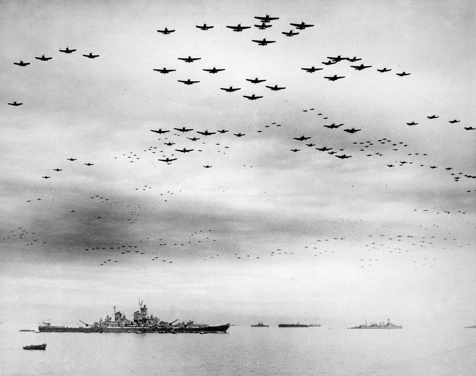 Navy planes fly over the battleship USS Missouri in Tokyo Bay, Sept. 2, 1945, to commemorate the signing of surrender documents by Japan.