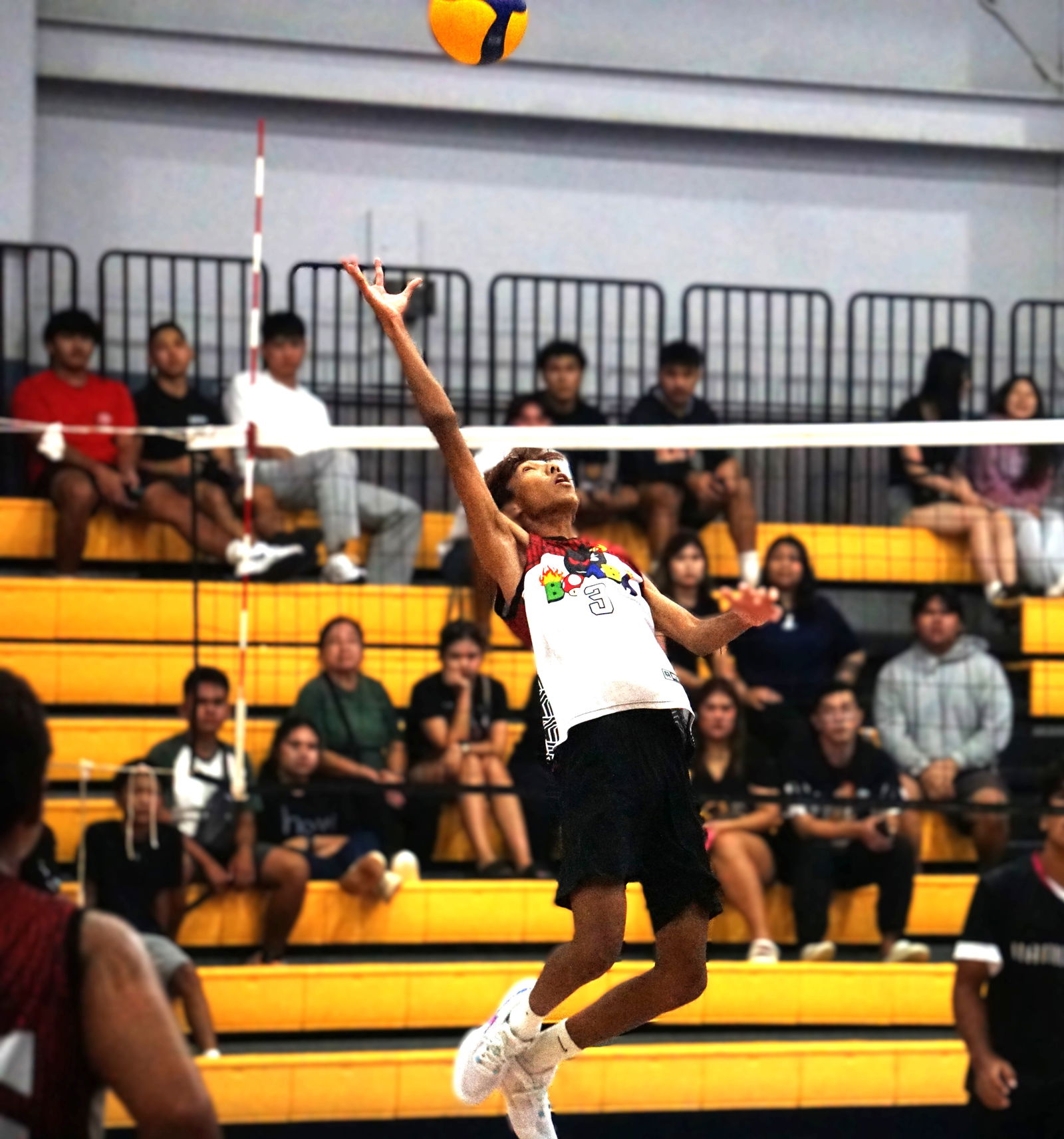 Bomba’s Seth Hong rises for a spike return during a men’s division game in the 4 Starz Marianas Club’s 2nd Annual Fall Fest Volleyball Tournament 2025 at the Ada gym.Photo by James F. Sablan Jr.