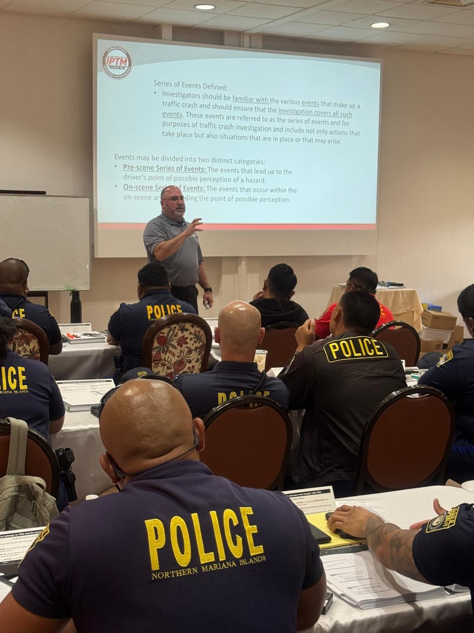 Institute of Police Technology and Management instructor Roman Serrano guides officers through the traffic crash course.