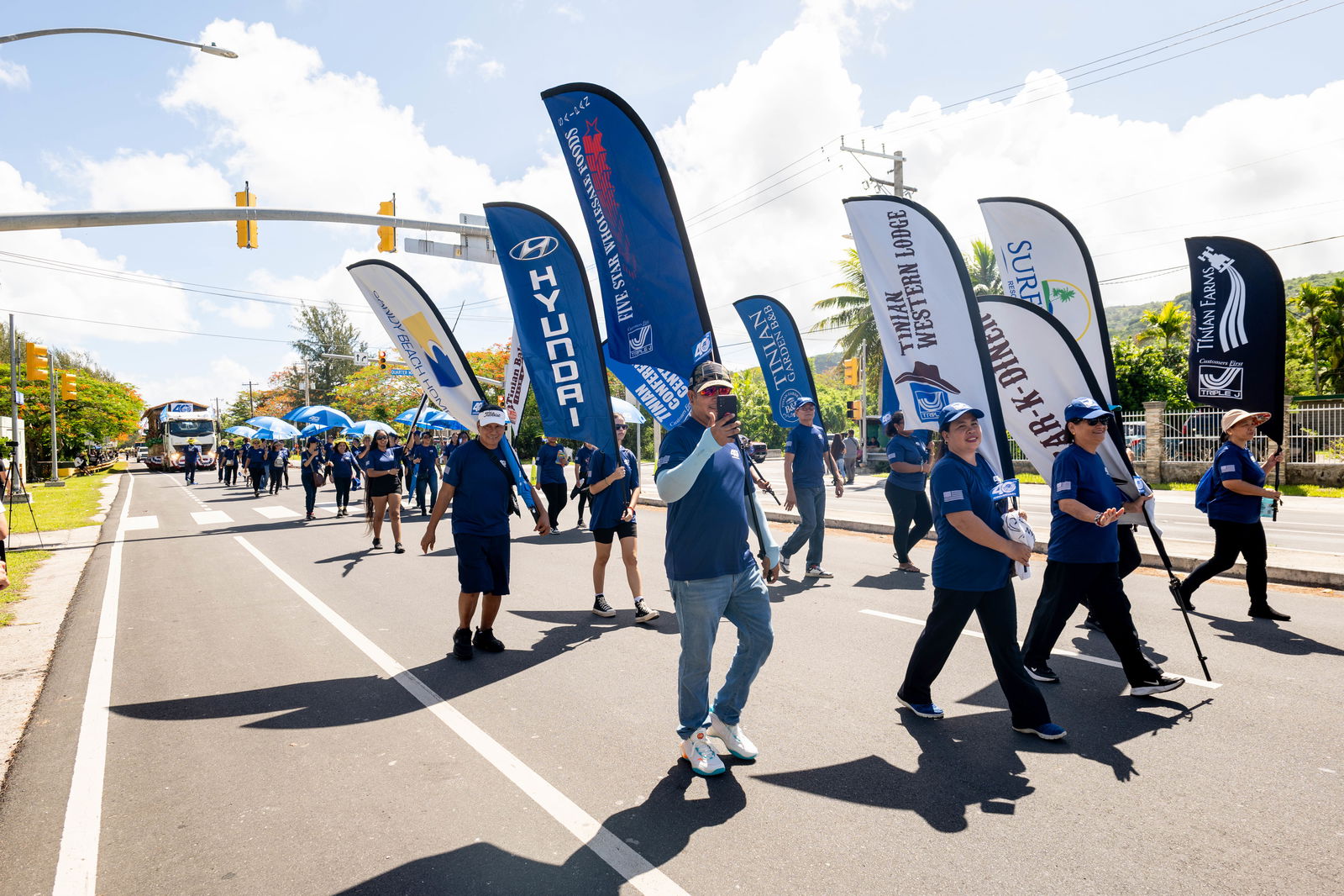 Triple J employees take part in the 2025 Liberation Day Parade.