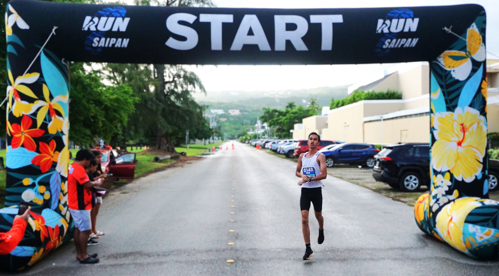 Sildrey Veloria finishes first in the men’s 10K category of the Run Saipan Half Marathon 2025 on Micro Beach Road.