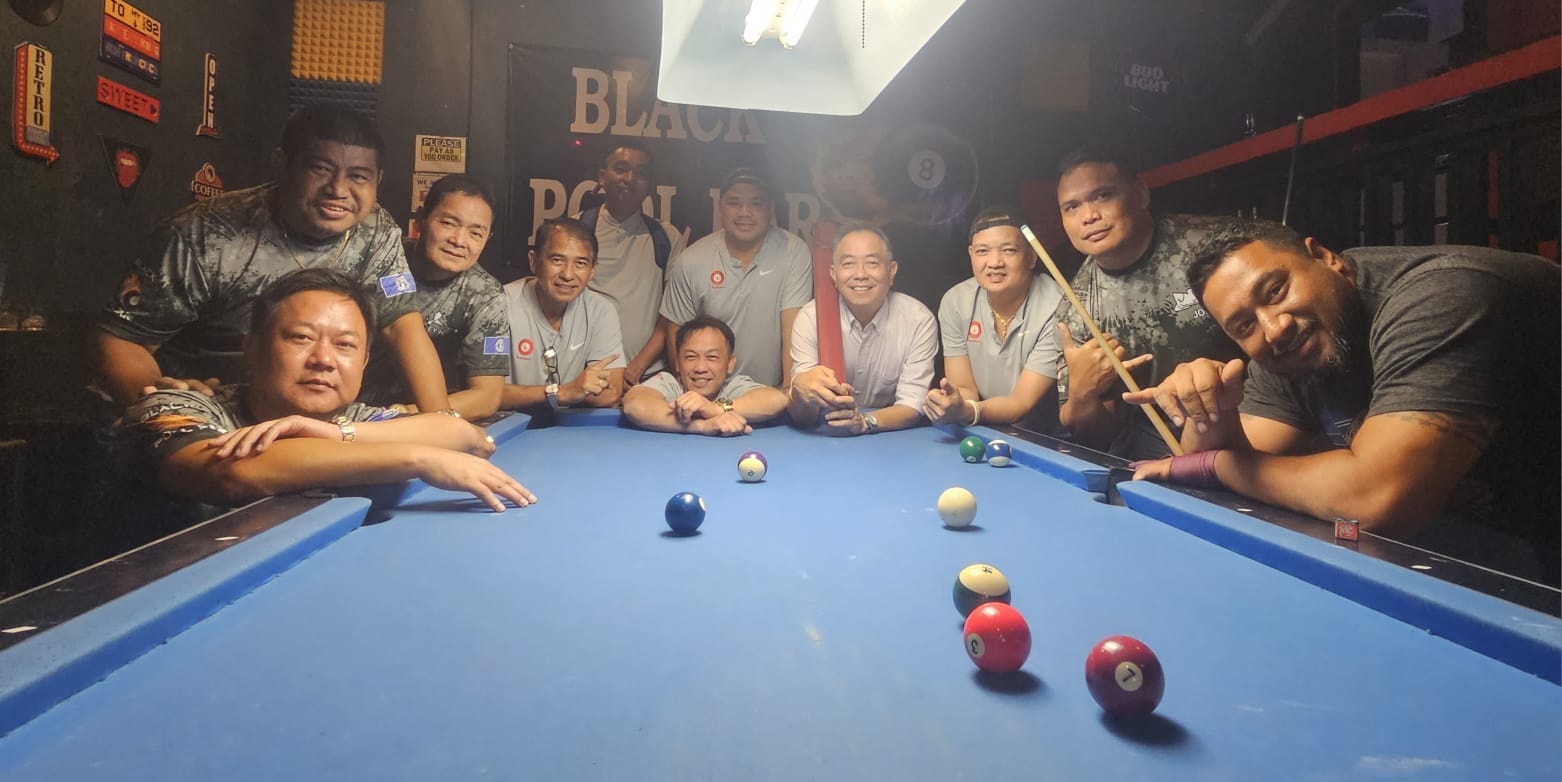 Black 8 Ideal Signs Rustler and Black 8 Crooked Arrow players pose for a group photo after their match in the Tuesday division of the 2025 SBA Budweiser Open 8-Ball League at the Black 8 Pool Bar on Tuesday night.Contributed photo